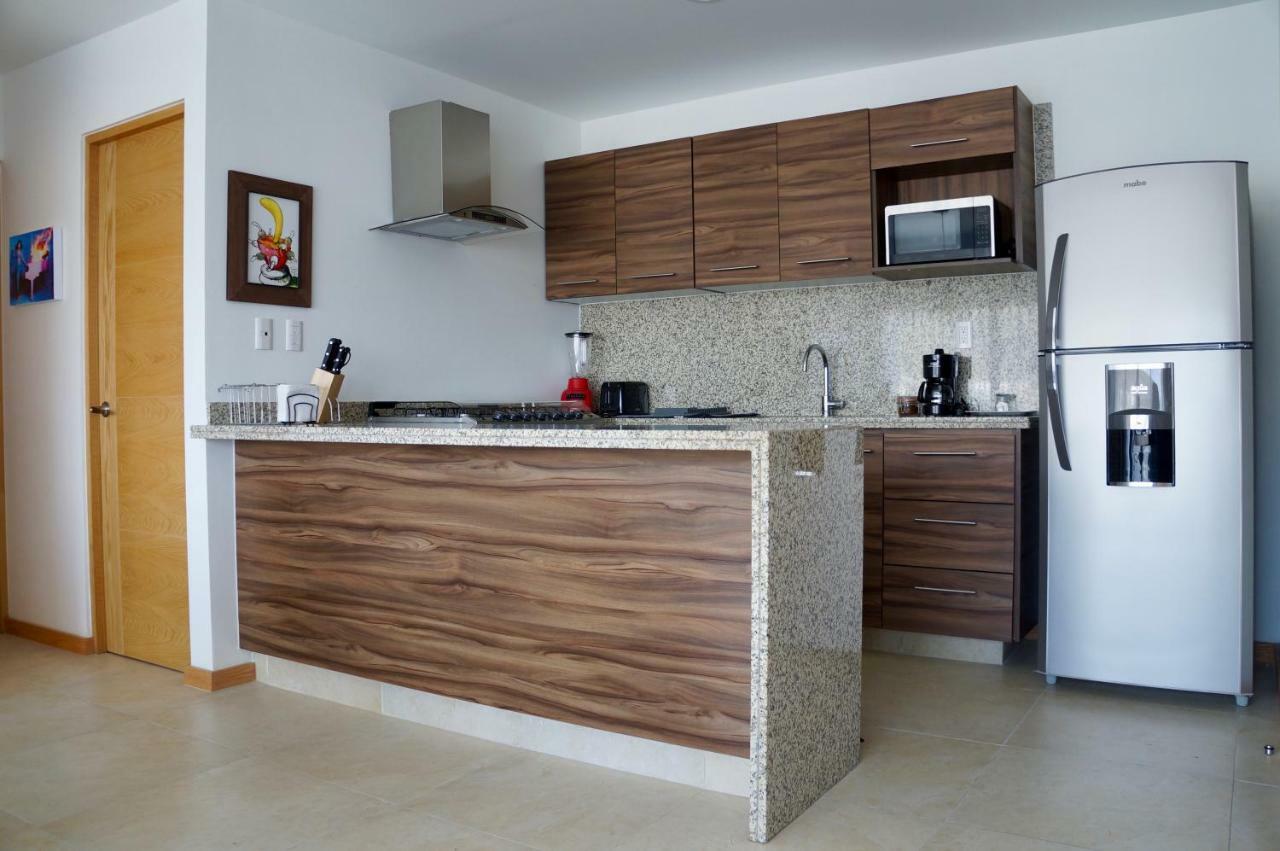 Metropolitan Suites Zapopan Bagian luar foto